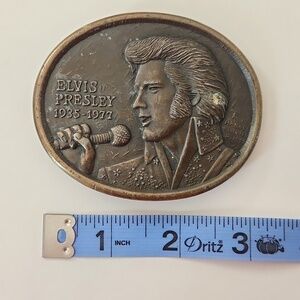 47.  Official vtg Elvis Presley belt buckle